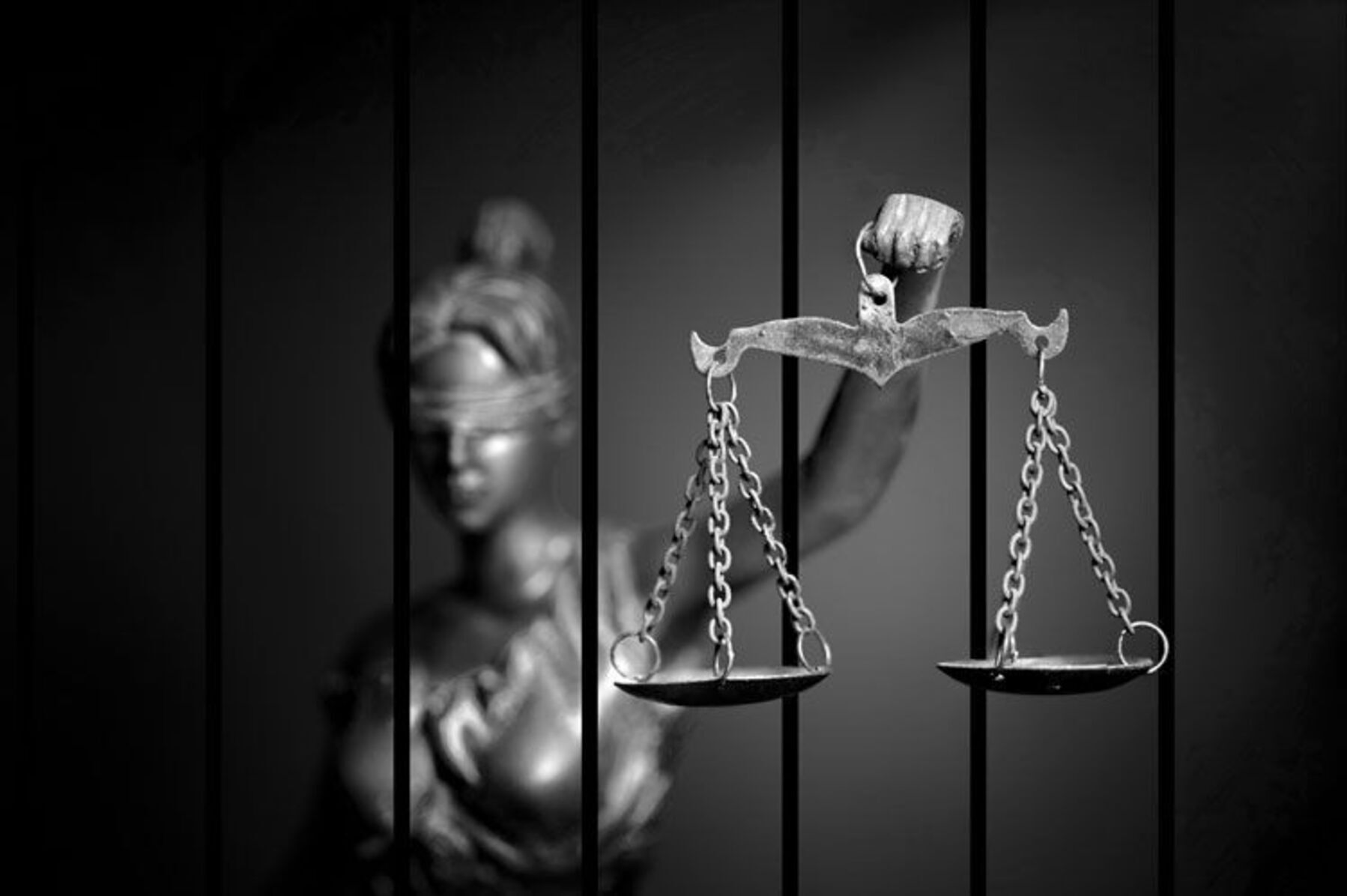 Lady justice behind bars